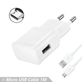 a close up of a white charger and a cable