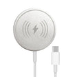 a close up of a white charger with a lightning plug attached