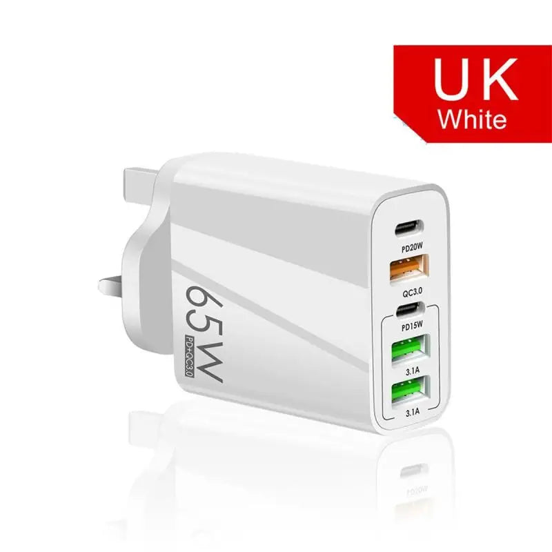 a close up of a white usb charger with a red uk white sticker