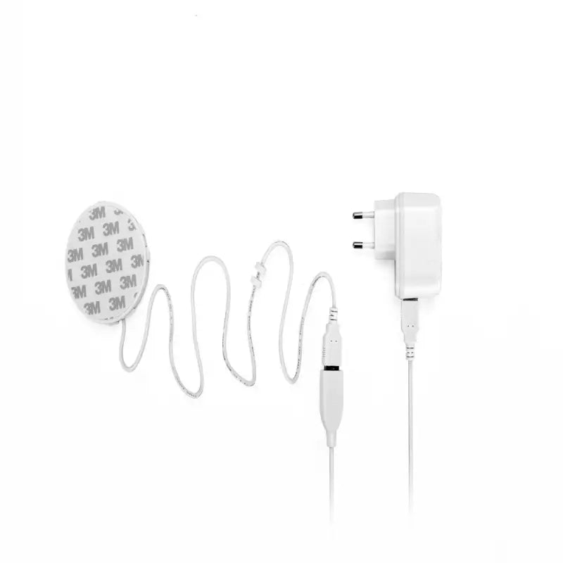 a close up of a white headphone with a cord and a charger