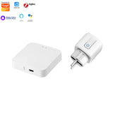 A close up of a white device with a charger and a cable