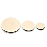 three white round discs with black edges