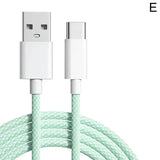 a close up of a white and green cable connected to a phone