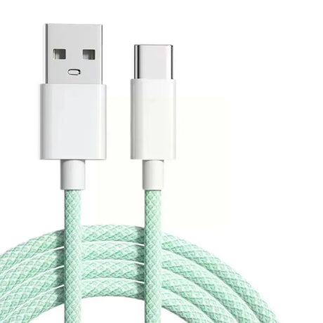 a close up of a white and green cable connected to a phone