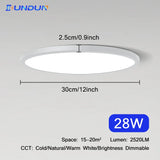 a close up of a white ceiling light with a blue light