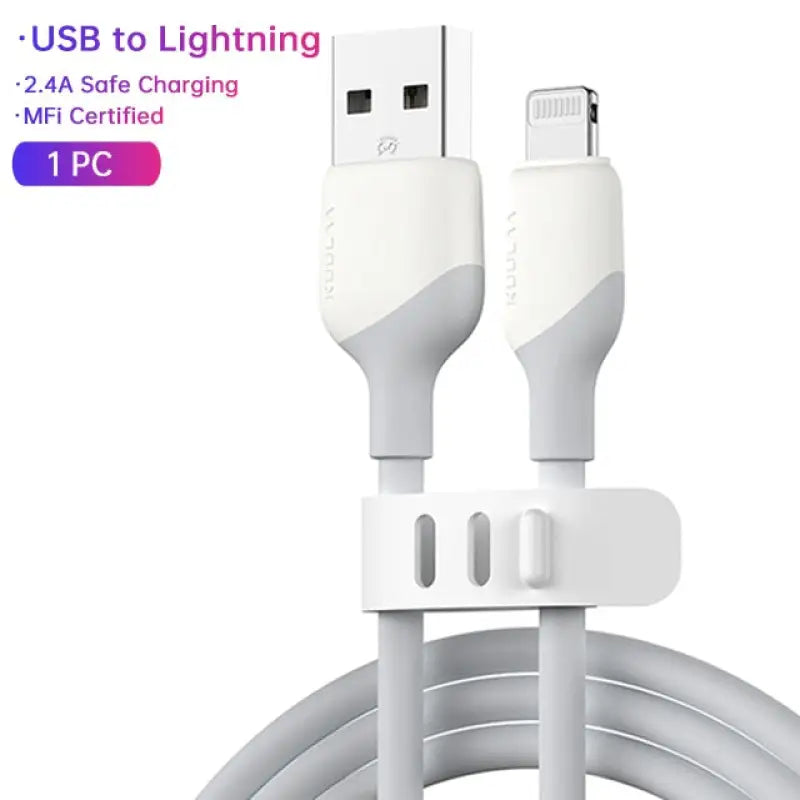 a close up of a white usb to lightning cable connected to a charger