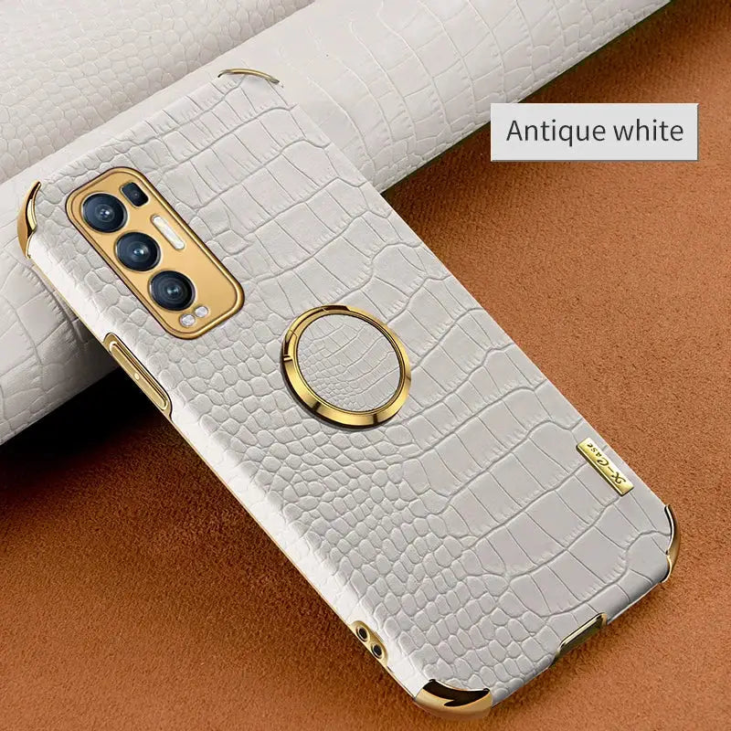a close up of a white phone case with a gold ring