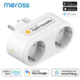 A close up of a white plug with a google home button