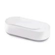 a close up of a white rectangular dish on a white surface