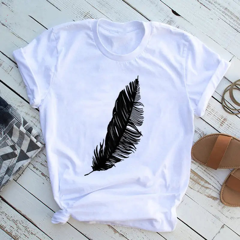 a white shirt with a black feather on it