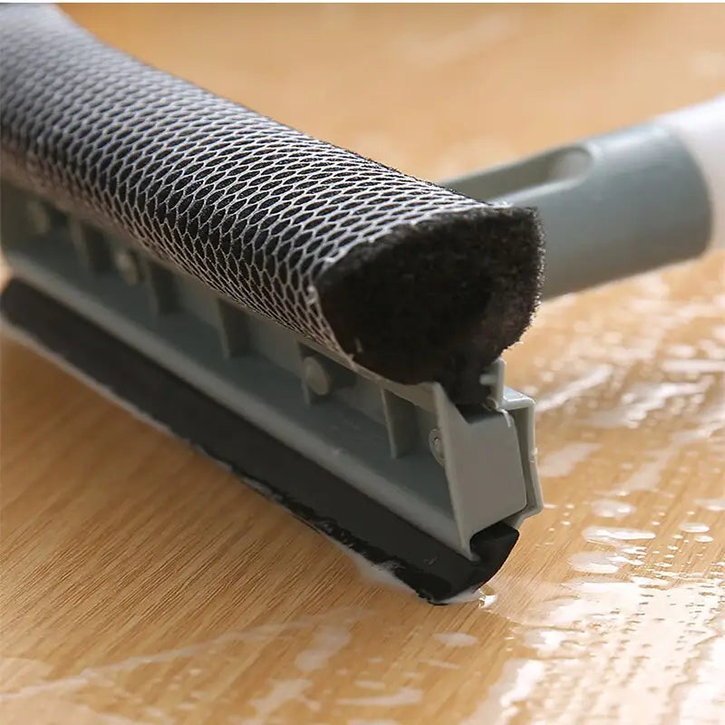 a close up of a metal wire on a wooden table