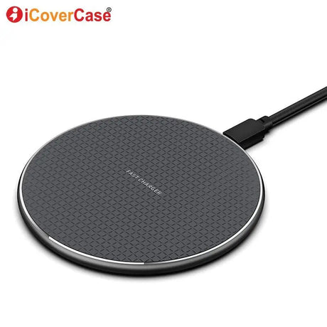 a close up of a wireless charger with a cable attached