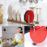 a close up of a woman in a kitchen with a sink and a rack