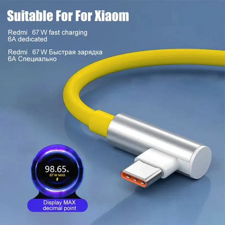 A close up of a yellow and white cable connected to a charger