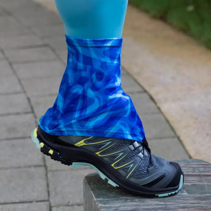 a person wearing a pair of blue and yellow socks