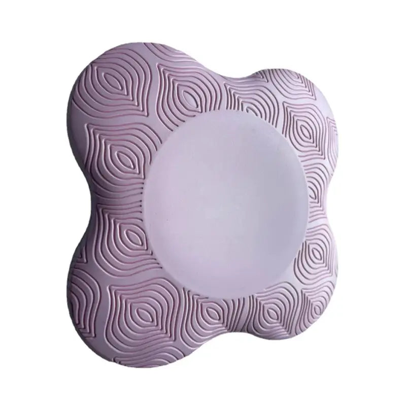 a purple plate with a circular design on it