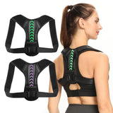 a woman wearing a black sports bra top with green arrows on the back