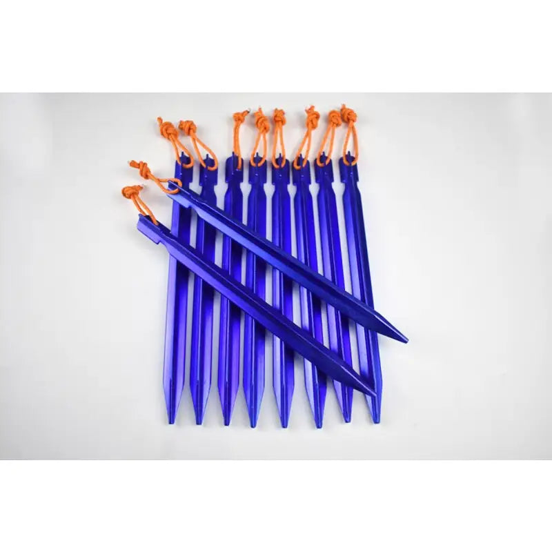 a set of blue plastic darts with orange handles