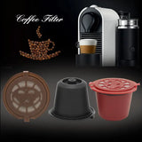 a close up of a coffee maker and a cup of coffee