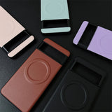 Collection of colorful smartphone cases or covers with magnetic attachments.