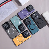 A collection of colorful smartphone cases with integrated magnetic rings.