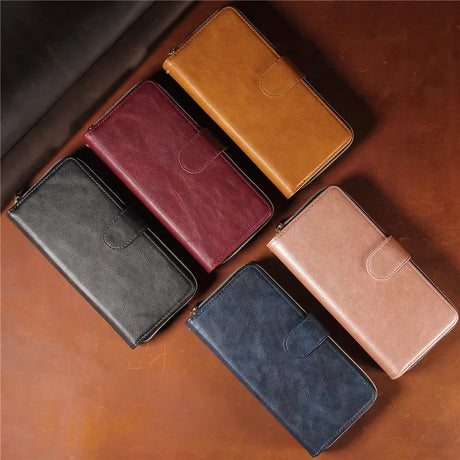 Collection of leather phone cases or wallets in various colors.