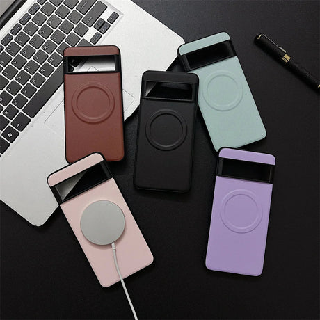 Collection of smartphone cases in various colors with circular cutouts on the back.