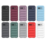 A collection of smartphone cases in various colors, featuring a ribbed, padded design and a horizontal camera cutout.