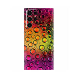 a colorful abstract painting with water droplets
