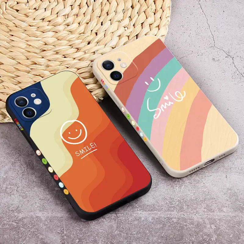 two colorful iphone cases with the same logo