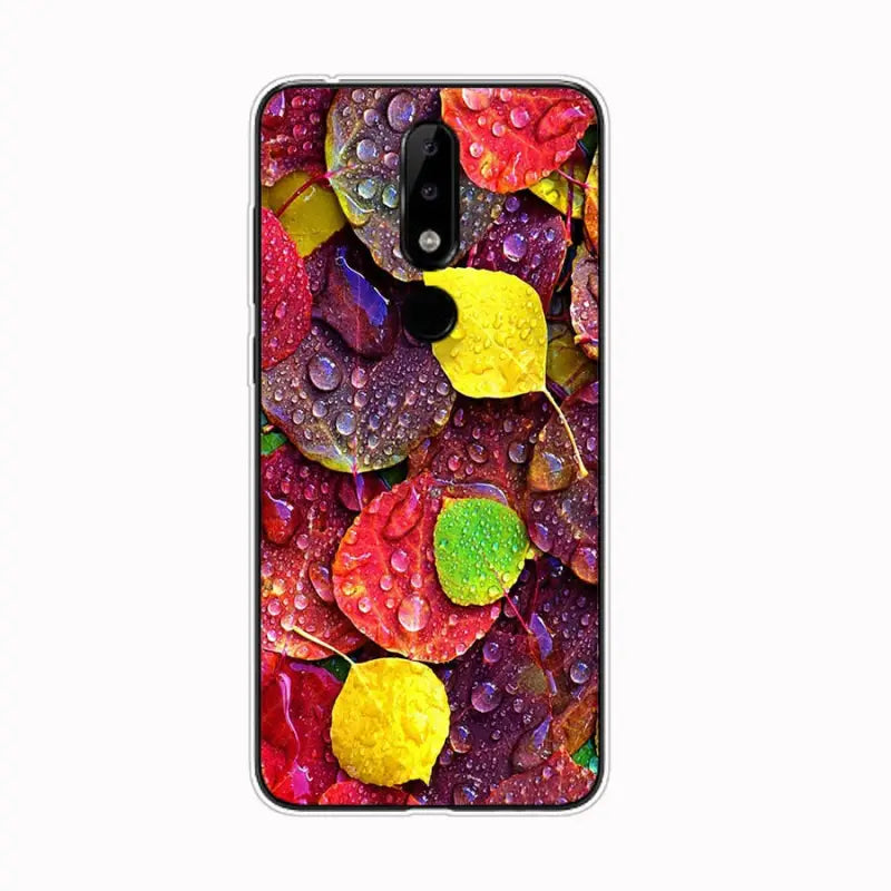 colorful leaves and water drops on white background for the google pixel