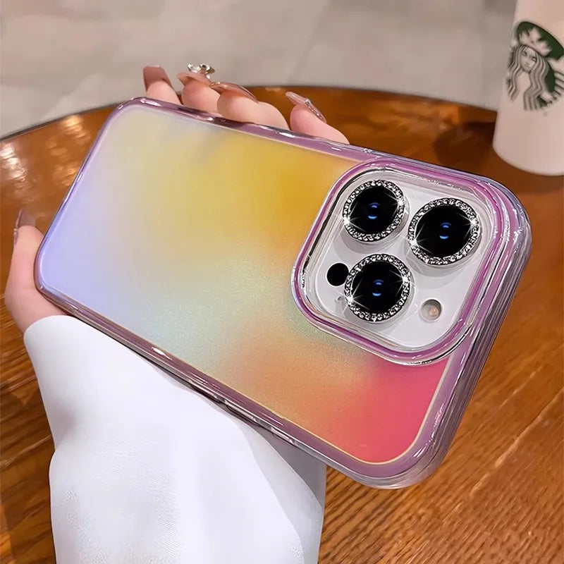 Colorful phone case with jeweled camera lenses.