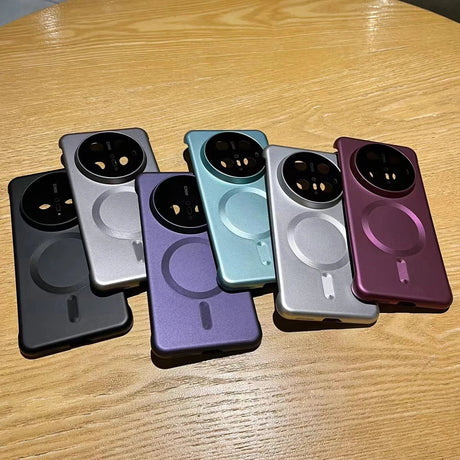 Colorful phone cases with circular camera cutouts.