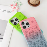 Colorful phone cases with geometric cutout patterns and camera lens openings.