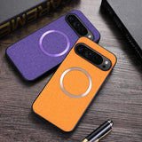 Colorful smartphone cases with circular magnetic attachments.