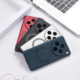 Colorful smartphone cases with circular camera cutouts and ring holders.