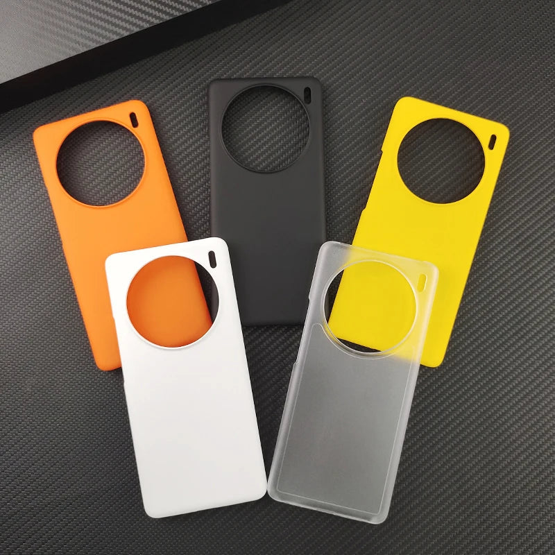 Colorful smartphone cases with circular cutouts arranged in a fan pattern.