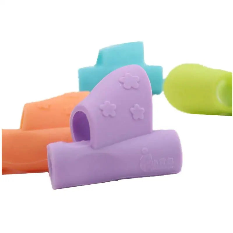 a set of four colorful soap bars