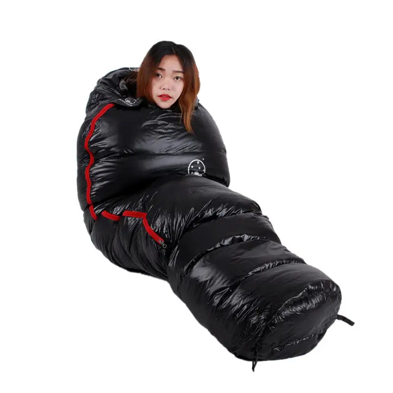 a woman in a sleeping bag