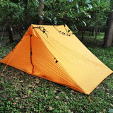 a tent in the woods