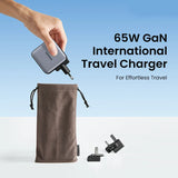 Compact 65W GaN international travel charger with interchangeable plugs and carrying pouch.