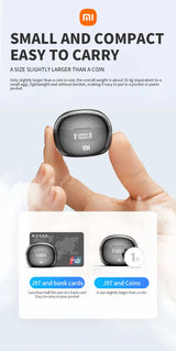 Compact digital timer or stopwatch device held between two fingers.