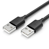 a close up of a pair of black usb cables on a white surface
