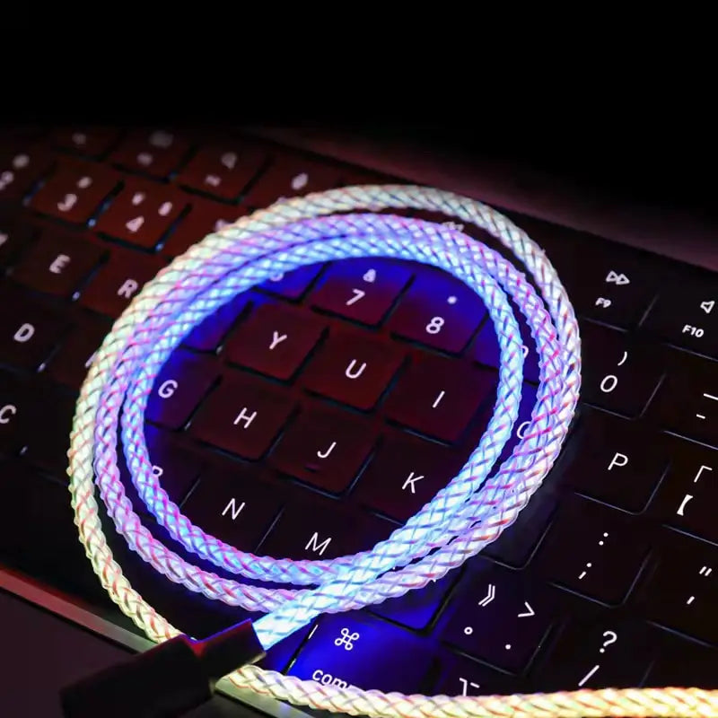 a computer keyboard with a glowing rope on it