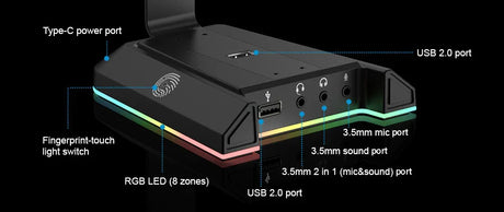 Gaming console or external device hub with multiple ports and RGB lighting.