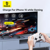 Gaming controller connected to a smartphone while displaying a racing game on a TV screen.