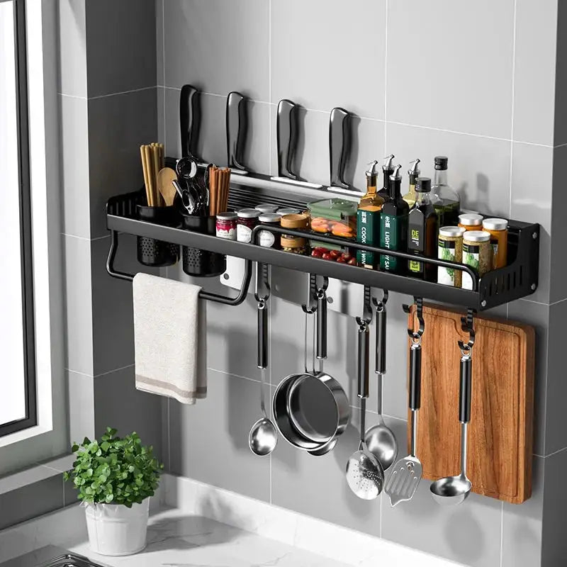 a kitchen shelf with pots and uts hanging on it