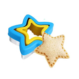 there is a cookie cutter and a cookie star shaped cookie cutter