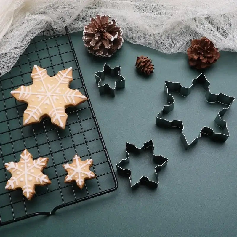 a cookie with a star and snowflakes on top