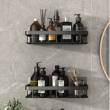 two black shelves with soap bottles and soap bottles on them